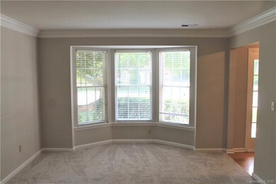 In The LR, A Bay Window & Crown Moulding