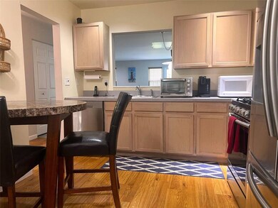 Kitchen featuring appliances with stainless steel 