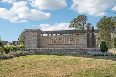 Community sign with a lawn