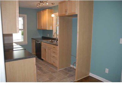 New maple cabinets, tile floor