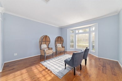 Bright and inviting room with large windows, light
