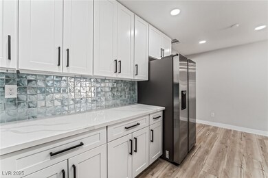 Kitchen featuring light wood-type flooring, light