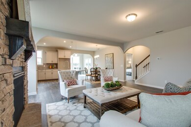 Super spacious living area! Optional Stone Fireplace *Photo of model*