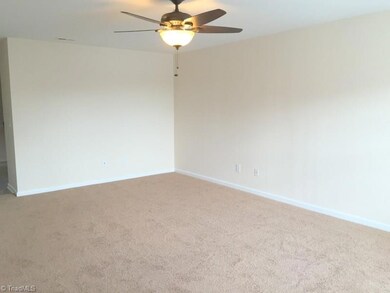 Enter this home to a very large living room with new carpet, paint, ceiling fan and window treatments!  Double window lets lots of natural light into this area!