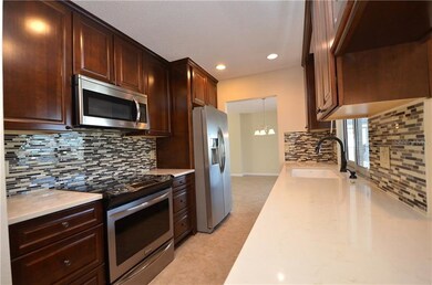 Updated kitchen with solid wood raised panel cabin