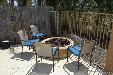 VIEW OF FIREPIT IN BACKYARD