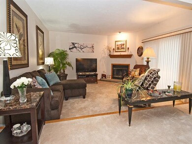 Cozy sunken family room with corner fireplace!