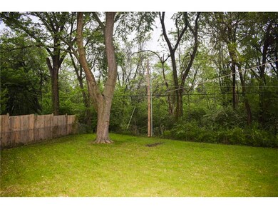 Lots of privacy wooded back yard.