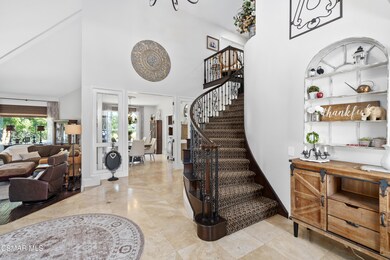 Foyer W/Custom Wrought Iron Staircase