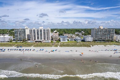 Drone / aerial view with a beach view and a water 