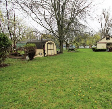 1816 W Jolly Rd, Lansing, MI 48910 - photo 5