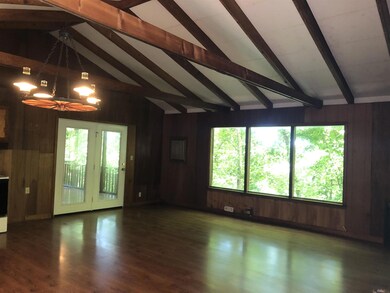 Large open room with large windows.