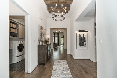 Soaring ceilings greet you as you enter the home