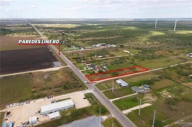 Birds eye view of property featuring a rural view