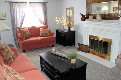 Living Room with wood burning fireplace.