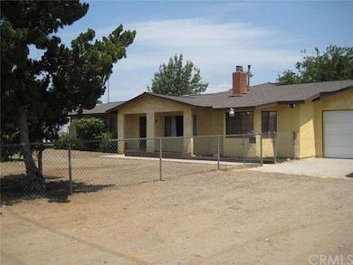 Front yard is fenced.