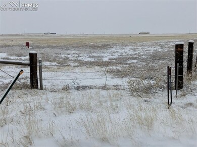 gate at corner of Log and Spencer