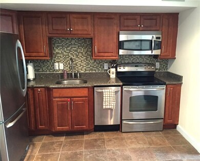 All on one level smart kitchen open to living area