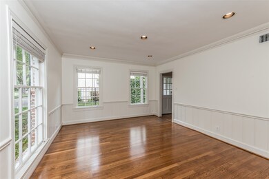 Dining room with wainscoting.  9' ceilings on first and second floors.