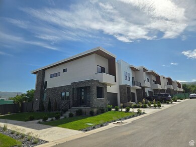 View of property with a residential view