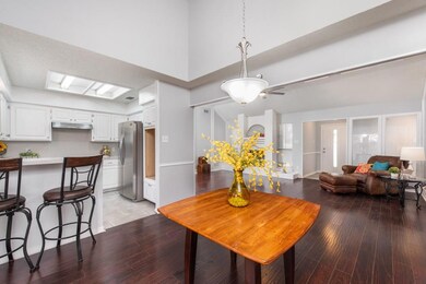 The floor plan has open space and high ceilings.