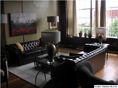 A living room with enough space to allow for two f