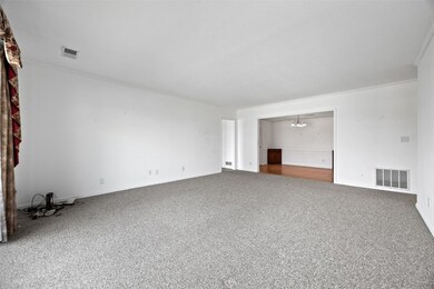 View from patio door into living room (LR) with gl