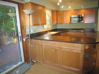 Sliding glass doors opening to deck