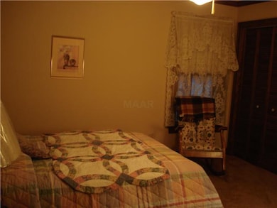 Front Bedroom offers a double door closet, crown m