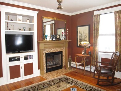 The fireplace is two-sided, the tiling is new.  Mo