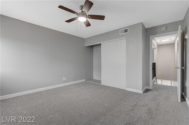 Unfurnished bedroom with carpet flooring, a closet