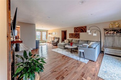 A generously sized family room with lots of natura