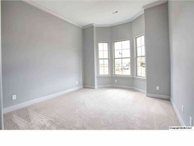 This room is full of natural light thanks to the nice bay window.