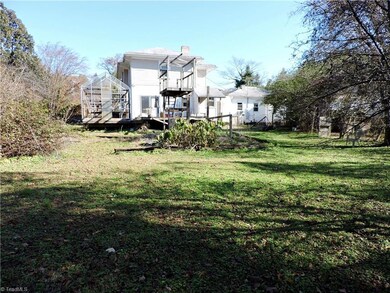 Generous back yard.  For an office or business, plenty of room for a parking lot.