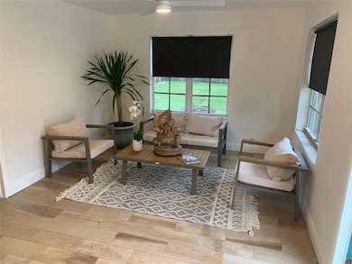 Spacious Living Room over looking the expansive yard