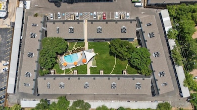 Aerial view of property and surrounding area with