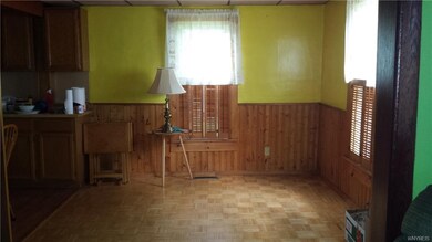 Dining room off kitchen on left