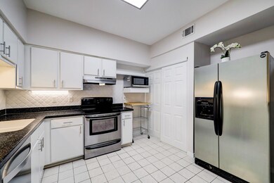 Updated kitchen with under-counter lighting.