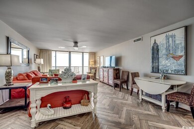 Living room featuring parquet flooring and ceiling