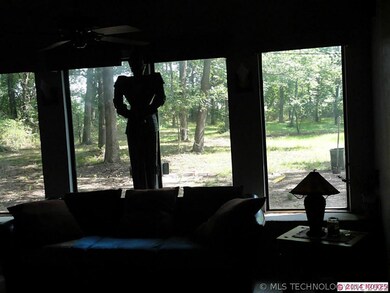 sunken living room over looking back yard.