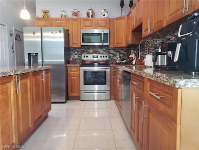 3304 10th St W, Lehigh Acres, FL 33971 - photo 6