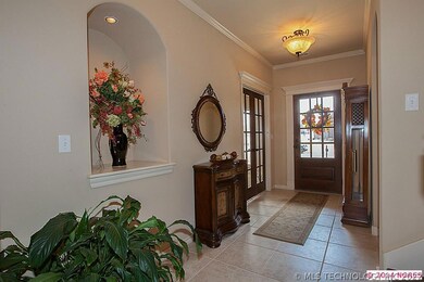 The entry features durable neutral colored ceramic