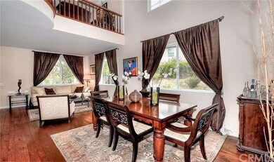 Dining room, dramatic vaulted ceiling accented wit