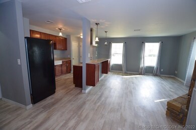 Spacious living room with new floors, new Pella wi