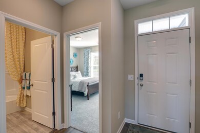 Front bedroom & Full bathroom. *Pictures are of model home, colors and finishes may vary. *