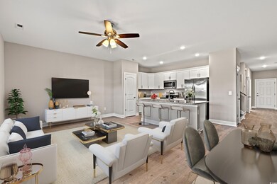 Living room featuring light hardwood / wood-style 