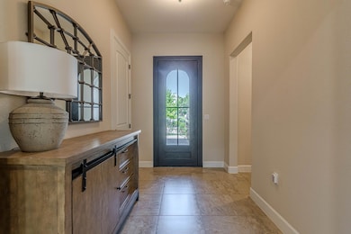 Foyer with baseboards
