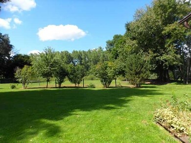Yard/Garden. Huge deep yard has fenced in garden a