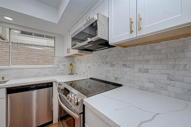 The kitchen has lots of counter space for cooking