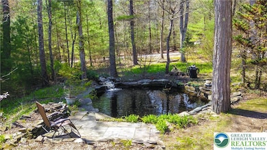 You are Greeted by the sound of the house pond wit